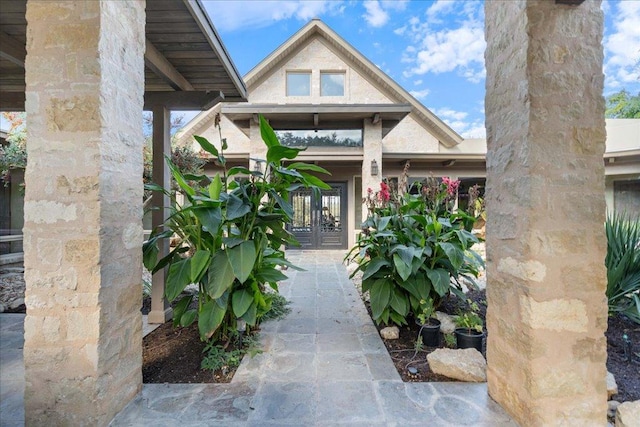 property entrance featuring french doors
