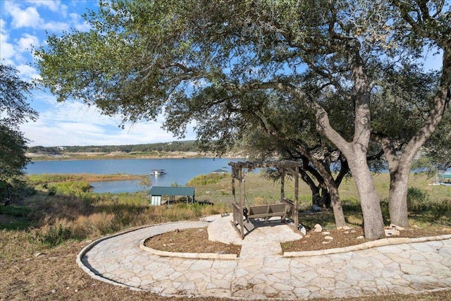 24736 Travis Lakeside Cv, Spicewood, TX 78669 - view of yard with a water view