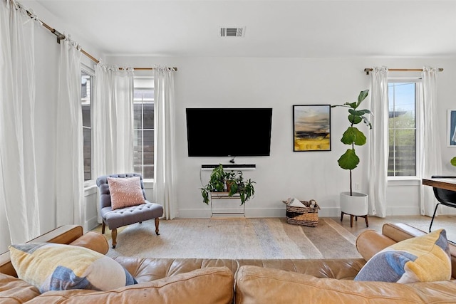 1503 Richcreek Rd Unit A, Austin, TX 78757 - living area featuring baseboards and wood finished floors