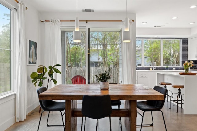 1503 Richcreek Rd Unit A, Austin, TX 78757 - dining area featuring healthy amount of natural light and recessed lighting