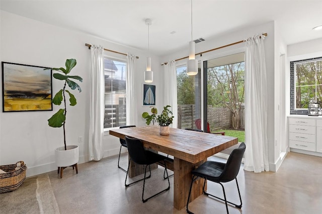 1503 Richcreek Rd Unit A, Austin, TX 78757 - dining space featuring concrete flooring