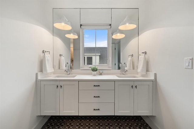 1503 Richcreek Rd Unit A, Austin, TX 78757 - full bathroom featuring double vanity and baseboards