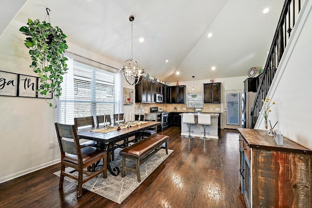 2605 Etta May Ln, Leander, TX 78641 - dining room with a chandelier, lofted ceiling, stairway, dark wood finished floors, and baseboards