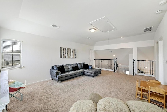 2605 Etta May Ln, Leander, TX 78641 - carpeted living area featuring attic access and baseboards