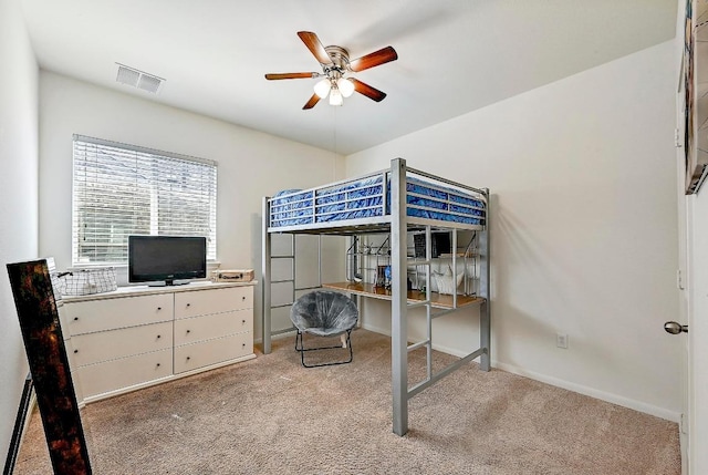 2605 Etta May Ln, Leander, TX 78641 - bedroom featuring light carpet, a desk, and a ceiling fan