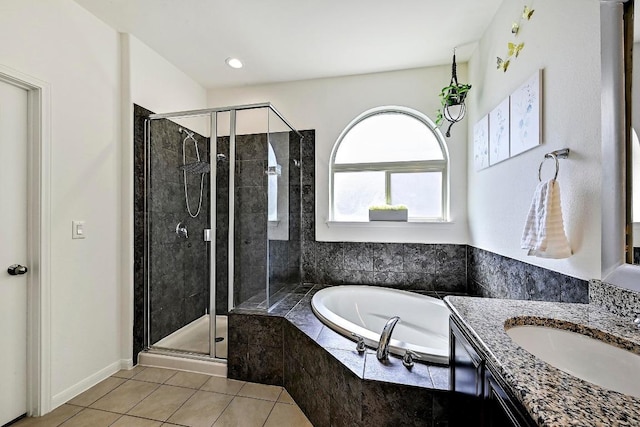 2605 Etta May Ln, Leander, TX 78641 - full bath featuring a garden tub, a stall shower, vanity, and tile patterned floors