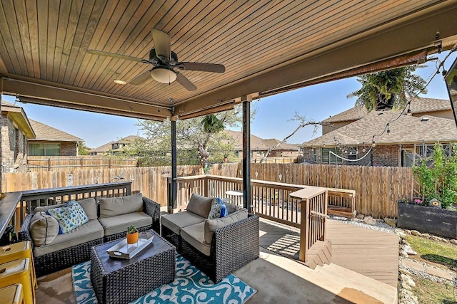 2605 Etta May Ln, Leander, TX 78641 - fenced backyard featuring outdoor lounge area, a deck, a ceiling fan, and a residential view