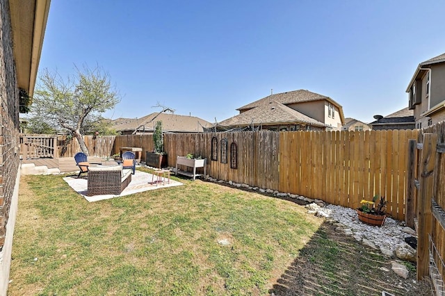 2605 Etta May Ln, Leander, TX 78641 - fenced backyard with a patio area