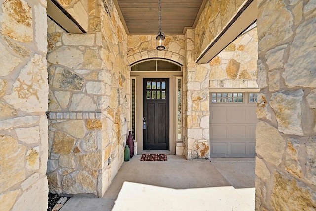 2605 Etta May Ln, Leander, TX 78641 - property entrance featuring stone siding and concrete driveway