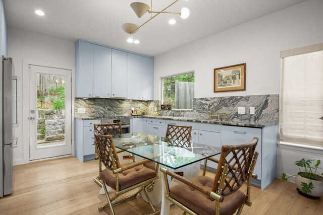 2007 Alameda Dr, Austin, TX 78704 - dining space with a chandelier, light wood-type flooring, and recessed lighting