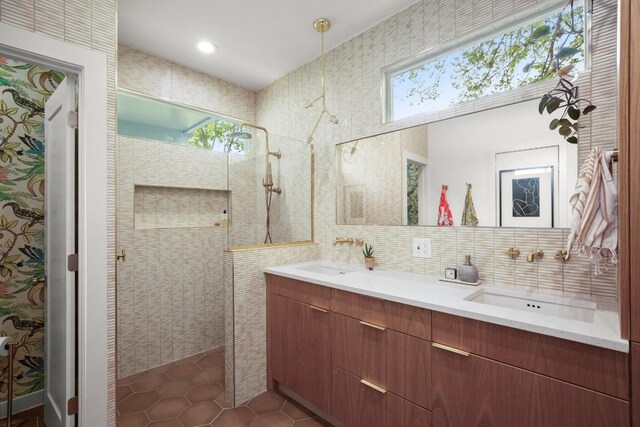 2007 Alameda Dr, Austin, TX 78704 - bathroom with walk in shower, double vanity, and healthy amount of natural light