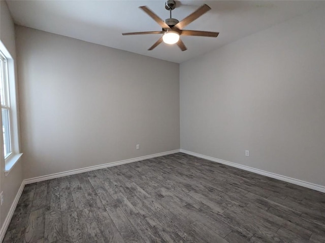 407 Gamel St, Lampasas, TX 76550 - unfurnished room featuring dark wood-style floors, a ceiling fan, and baseboards