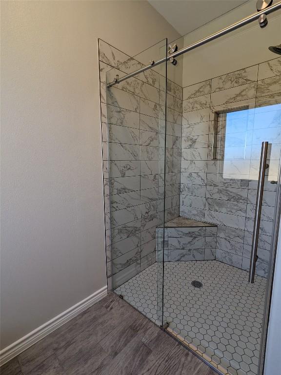 407 Gamel St, Lampasas, TX 76550 - full bath with a shower stall and baseboards