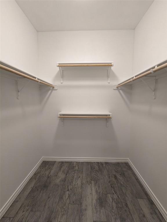 407 Gamel St, Lampasas, TX 76550 - walk in closet featuring wood finished floors