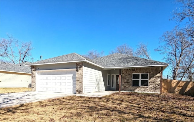 407 Gamel St, Lampasas, TX 76550 - ranch-style home with a garage, concrete driveway, brick siding, and roof with shingles