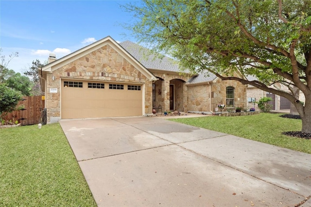 2009 Manada Trl, Cedar Park, TX 78641 - view of front of home with stone siding, a garage, concrete driveway, and a chimney