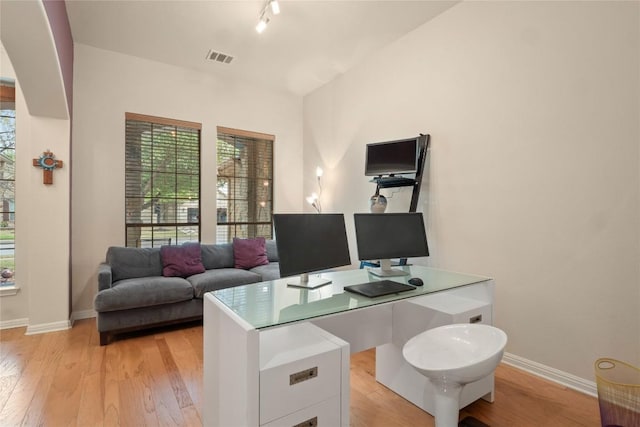 2009 Manada Trl, Cedar Park, TX 78641 - office space featuring healthy amount of natural light and light wood-style floors