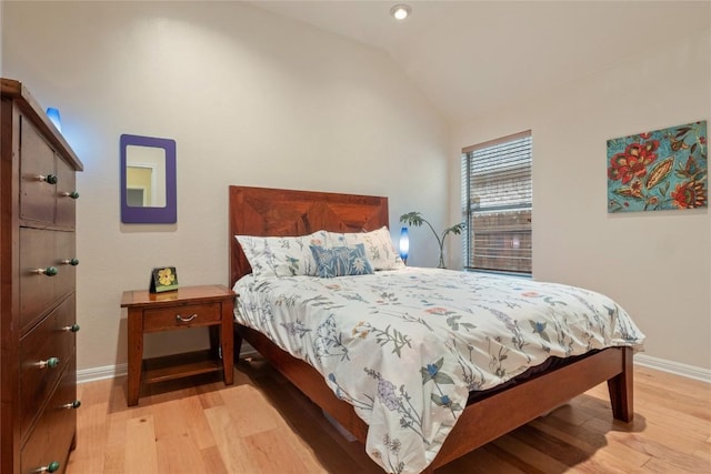 2009 Manada Trl, Cedar Park, TX 78641 - bedroom with light wood-style floors and vaulted ceiling