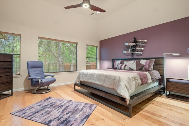 2009 Manada Trl, Cedar Park, TX 78641 - bedroom with wood finished floors, a towering ceiling, and ceiling fan