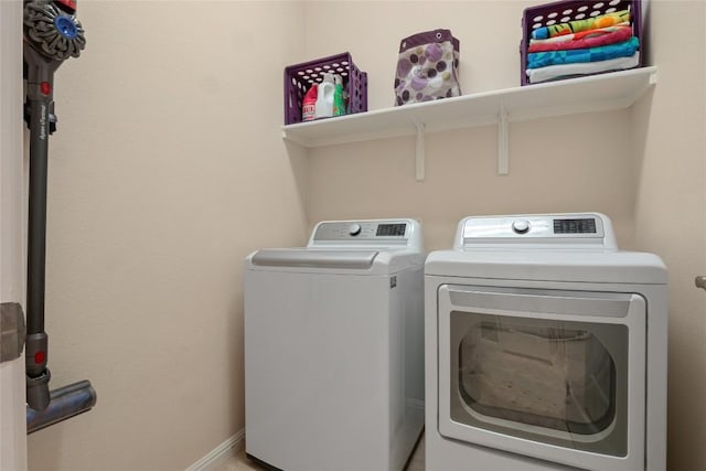 2009 Manada Trl, Cedar Park, TX 78641 - washroom with washer and dryer and baseboards
