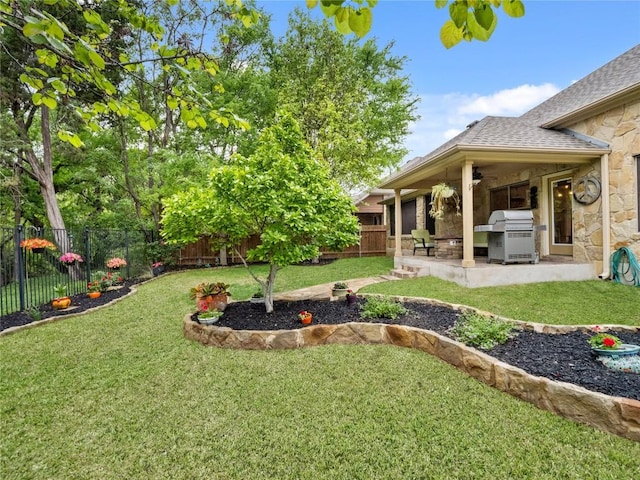 view of yard with a patio and a fenced backyard