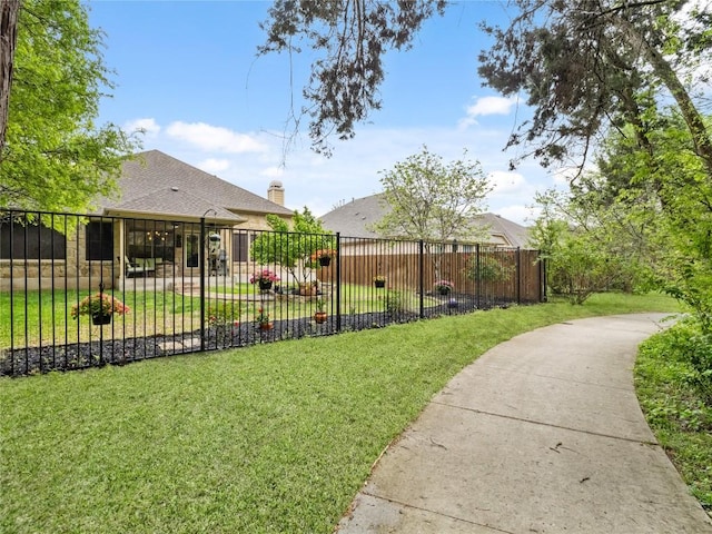view of yard featuring fence