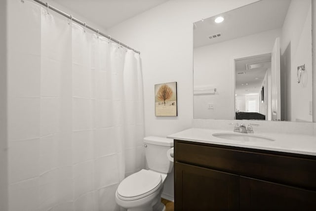 197 Buenos Aires, Kyle, TX 78640 - bathroom featuring toilet and vanity