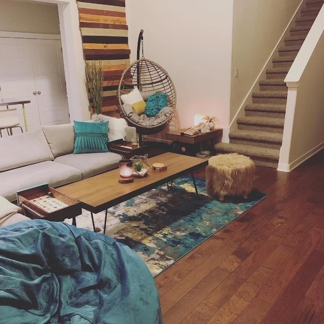 2101 Rivers Edge Way Unit 17, Austin, TX 78741 - living area featuring hardwood / wood-style floors, stairway, and baseboards