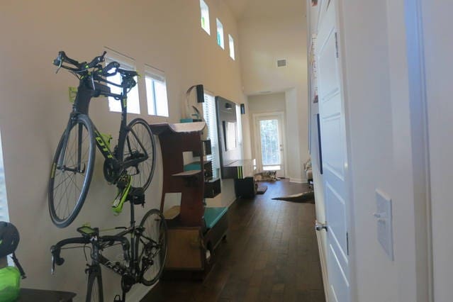 2101 Rivers Edge Way Unit 17, Austin, TX 78741 - entrance foyer featuring dark wood-style flooring and a towering ceiling