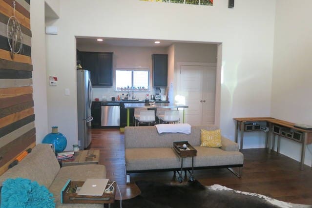 2101 Rivers Edge Way Unit 17, Austin, TX 78741 - living room featuring dark wood finished floors and recessed lighting