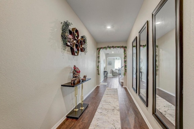 285 Kat Garnet Dr, Kyle, TX 78640 - hallway with dark wood finished floors and recessed lighting