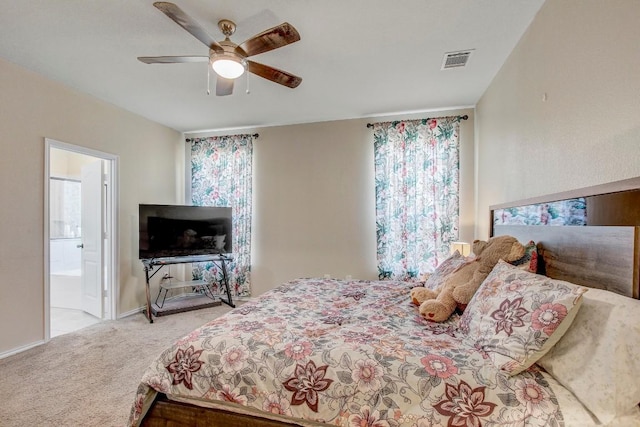 285 Kat Garnet Dr, Kyle, TX 78640 - carpeted bedroom featuring ceiling fan and connected bathroom
