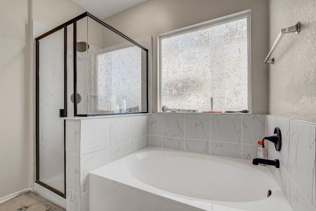 285 Kat Garnet Dr, Kyle, TX 78640 - full bathroom featuring a shower stall and a garden tub