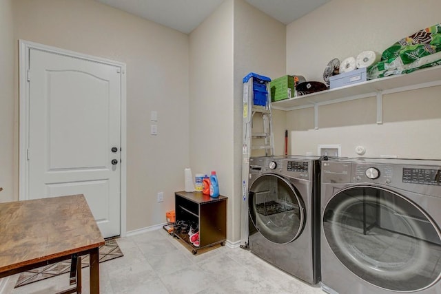 285 Kat Garnet Dr, Kyle, TX 78640 - laundry room with independent washer and dryer and baseboards
