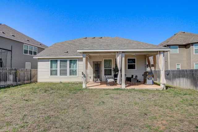 285 Kat Garnet Dr, Kyle, TX 78640 - back of house with a patio area and a fenced backyard