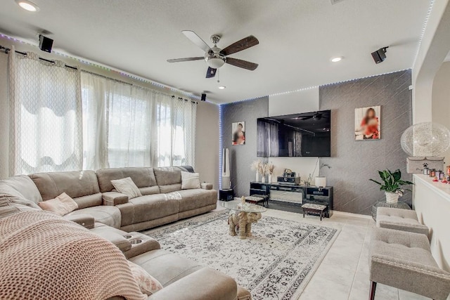 285 Kat Garnet Dr, Kyle, TX 78640 - living room featuring a ceiling fan, recessed lighting, and tile patterned floors