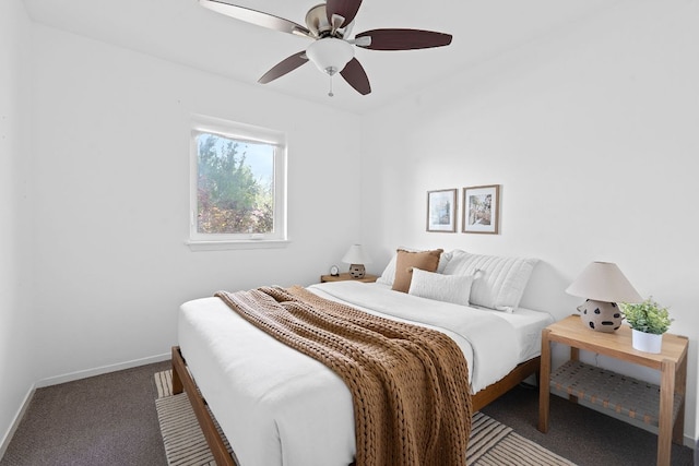 306 Tilbury Ln, Austin, TX 78745 - carpeted bedroom with baseboards and a ceiling fan