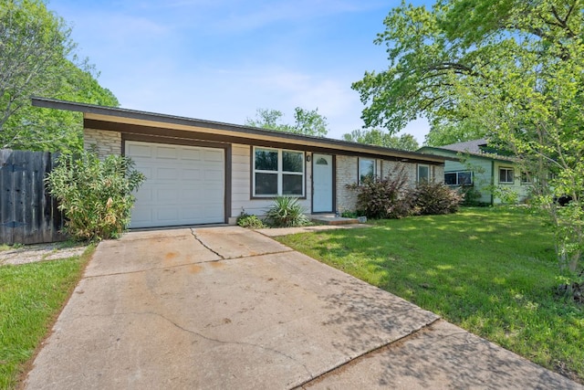306 Tilbury Ln, Austin, TX 78745 - ranch-style house with a garage and concrete driveway