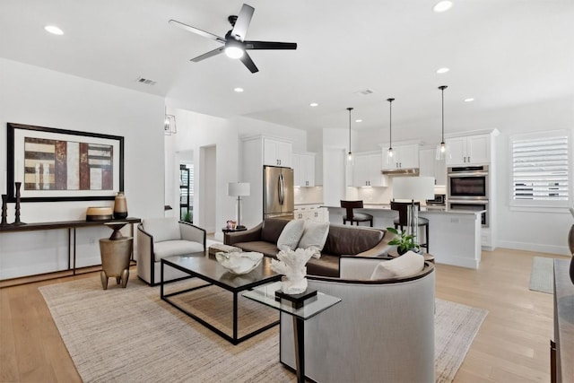744 Buffalo Trl, Liberty Hill, TX 78642 - living area with recessed lighting, light wood-style floors, and ceiling fan