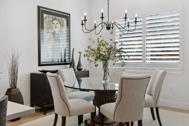 744 Buffalo Trl, Liberty Hill, TX 78642 - dining area featuring a chandelier and wood finished floors