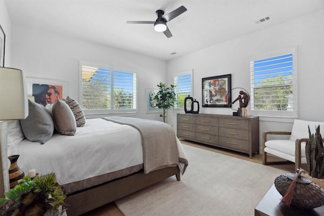 744 Buffalo Trl, Liberty Hill, TX 78642 - bedroom featuring ceiling fan and light wood-type flooring