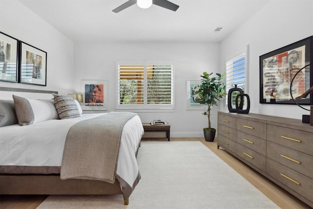 744 Buffalo Trl, Liberty Hill, TX 78642 - bedroom featuring light wood-type flooring and a ceiling fan