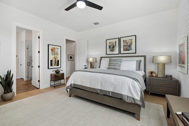 744 Buffalo Trl, Liberty Hill, TX 78642 - bedroom with wood finished floors and ceiling fan
