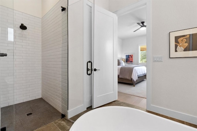 744 Buffalo Trl, Liberty Hill, TX 78642 - ensuite bathroom featuring tiled shower and a freestanding tub