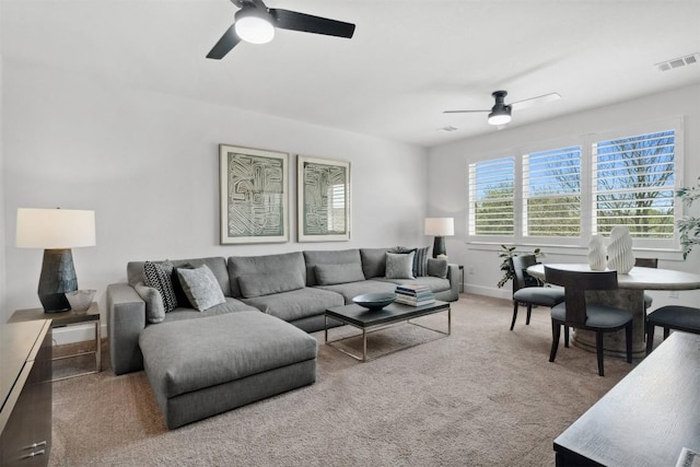 744 Buffalo Trl, Liberty Hill, TX 78642 - carpeted living area with ceiling fan and baseboards