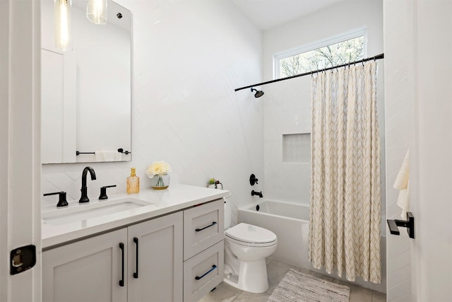 bathroom with tile patterned floors, toilet, backsplash, shower / tub combo with curtain, and vanity