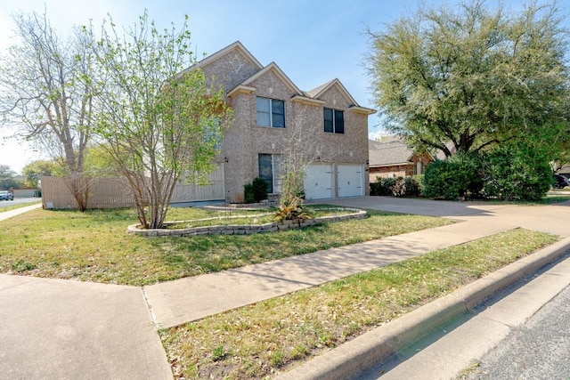 8613 Columbia Falls Dr, Round Rock, TX 78681 - traditional home featuring concrete driveway, a garage, and a front lawn