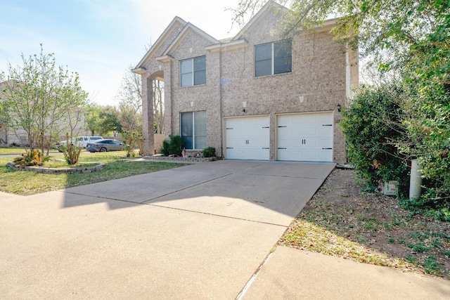 8613 Columbia Falls Dr, Round Rock, TX 78681 - traditional-style house with concrete driveway and an attached garage
