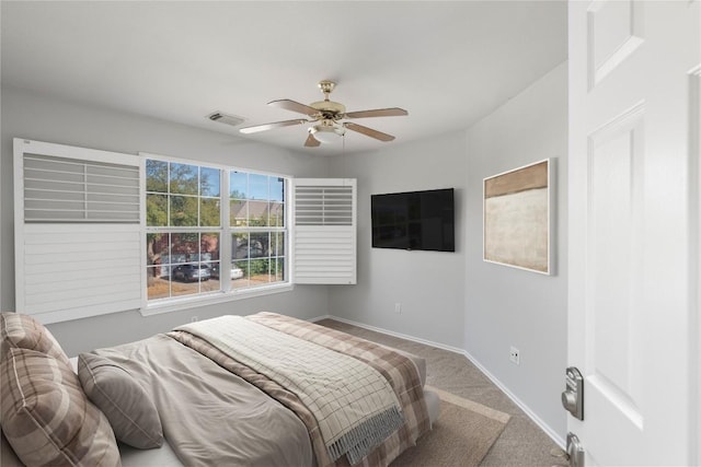 8613 Columbia Falls Dr, Round Rock, TX 78681 - carpeted bedroom with baseboards and ceiling fan