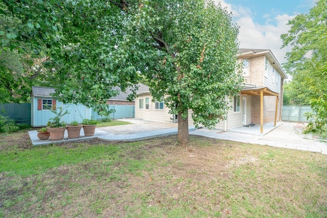 8613 Columbia Falls Dr, Round Rock, TX 78681 - back of property with a patio area, a fenced backyard, and a storage unit